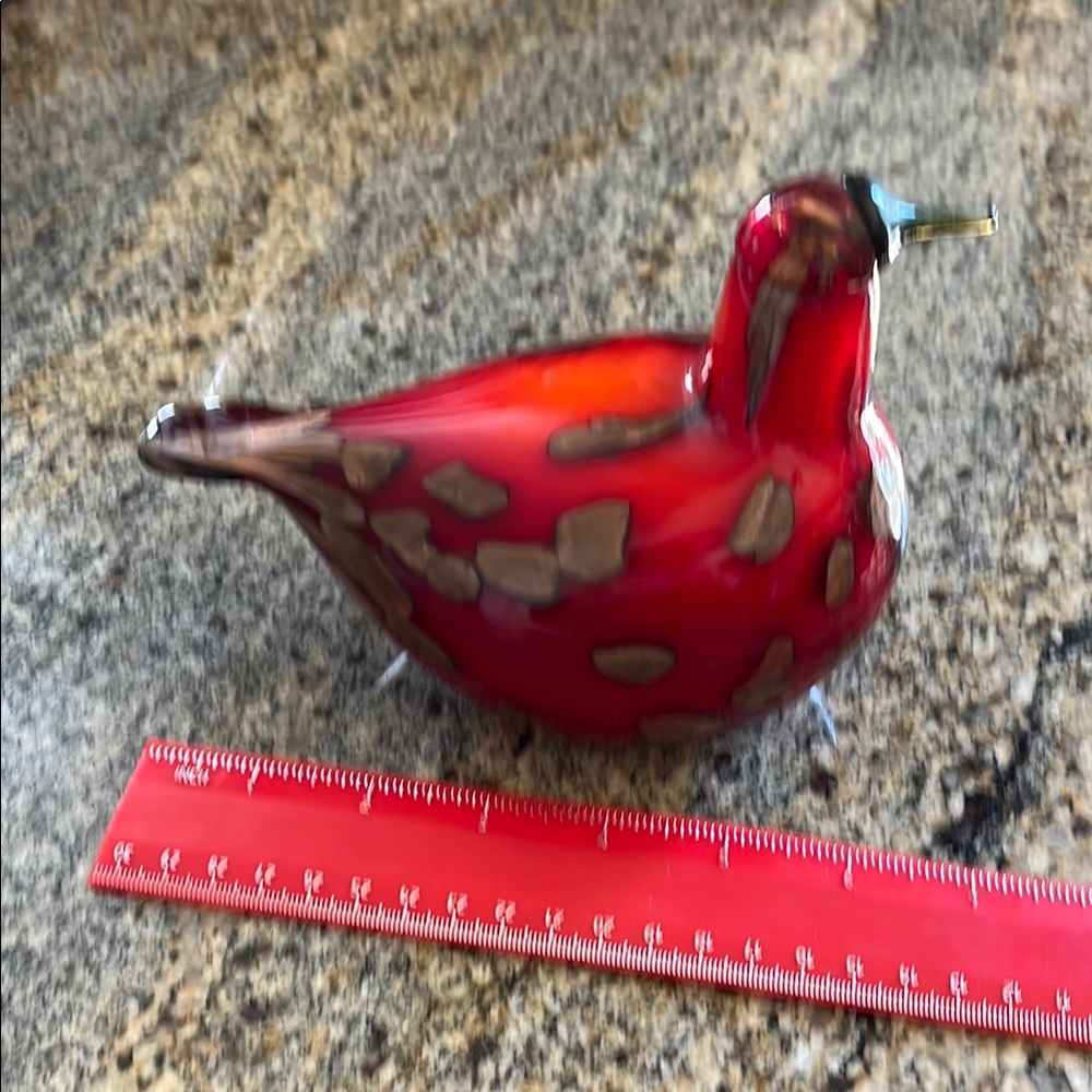 Red glass mouthblown bird by O Toikka